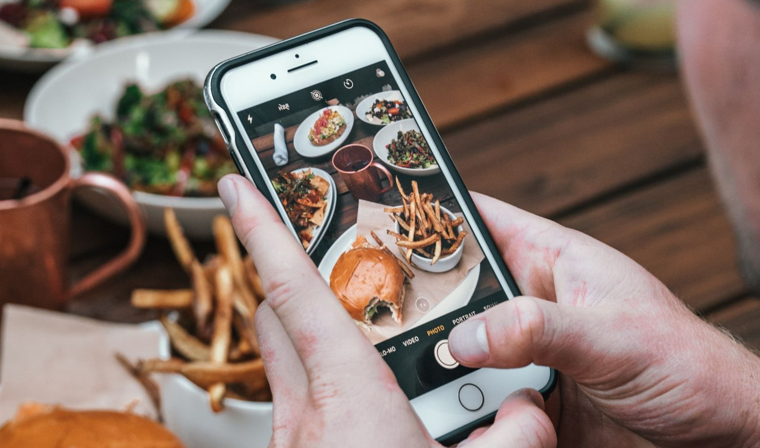 person holding gold iPhone 6